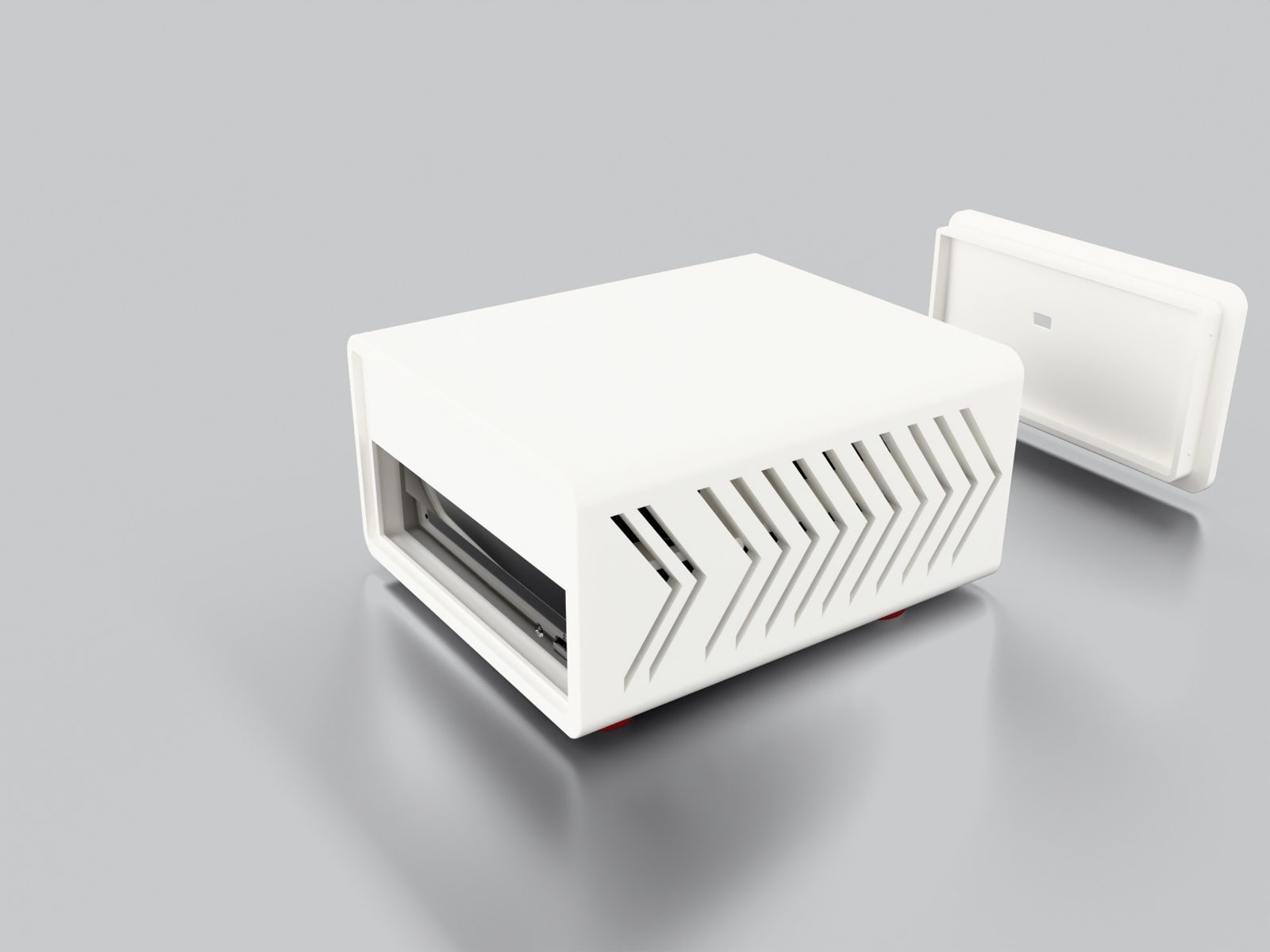 The two main 3D printed parts of Riparr: the vented chassis and the rear plate